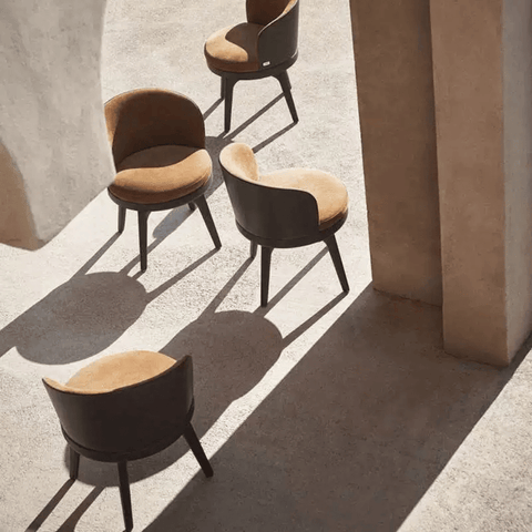 Fendi Leather Upholstered Barrel Swivel Dining Chair